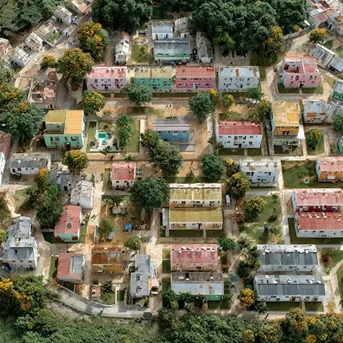 Aerial view of a low-income housing project, social housing apartment complex, multiple identical buildings